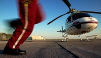 Medical crew scrambles to helicopter to depart, Hays, Kansas