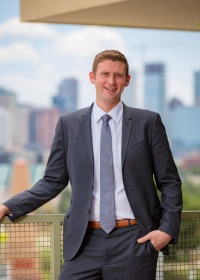 Executive Portrait of man, Denver city skyline