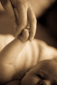 Newborn with Mom's hand, portrait