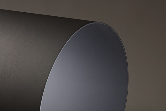 Studio image of metallic cylinder