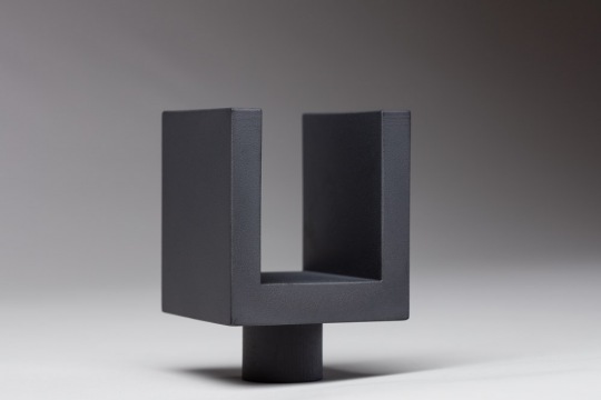 Studio image of dark metal product