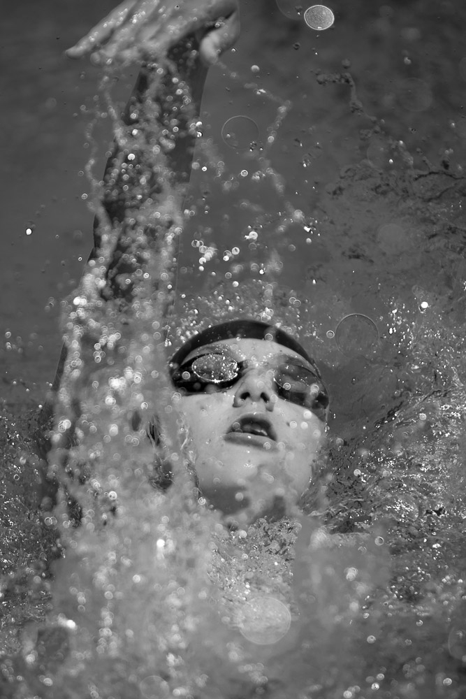 Backstroke swimmer, action shot