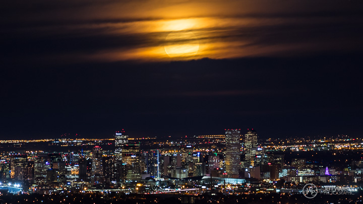 SuperMoon rises over the Denver skyline